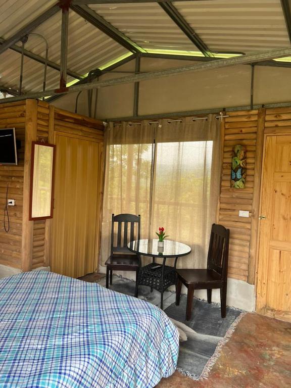 Postel nebo postele na pokoji v ubytování Cabañas venado