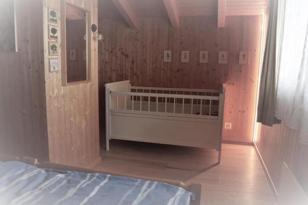 Postel nebo postele na pokoji v ubytování Revier Sytli im Höcheli