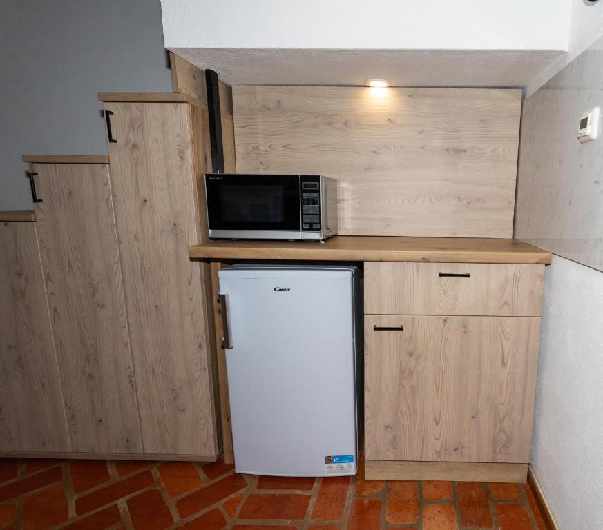 Kuchyň nebo kuchyňský kout v ubytování Zenroom Apartments