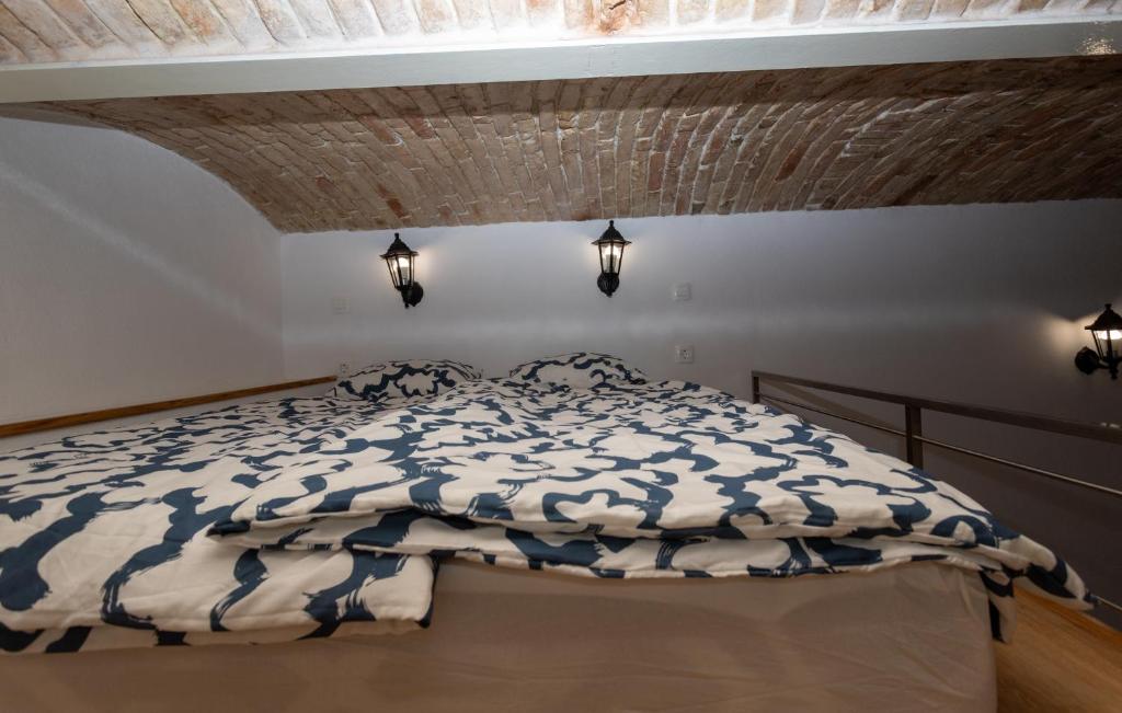 Postel nebo postele na pokoji v ubytování Zenroom Apartments