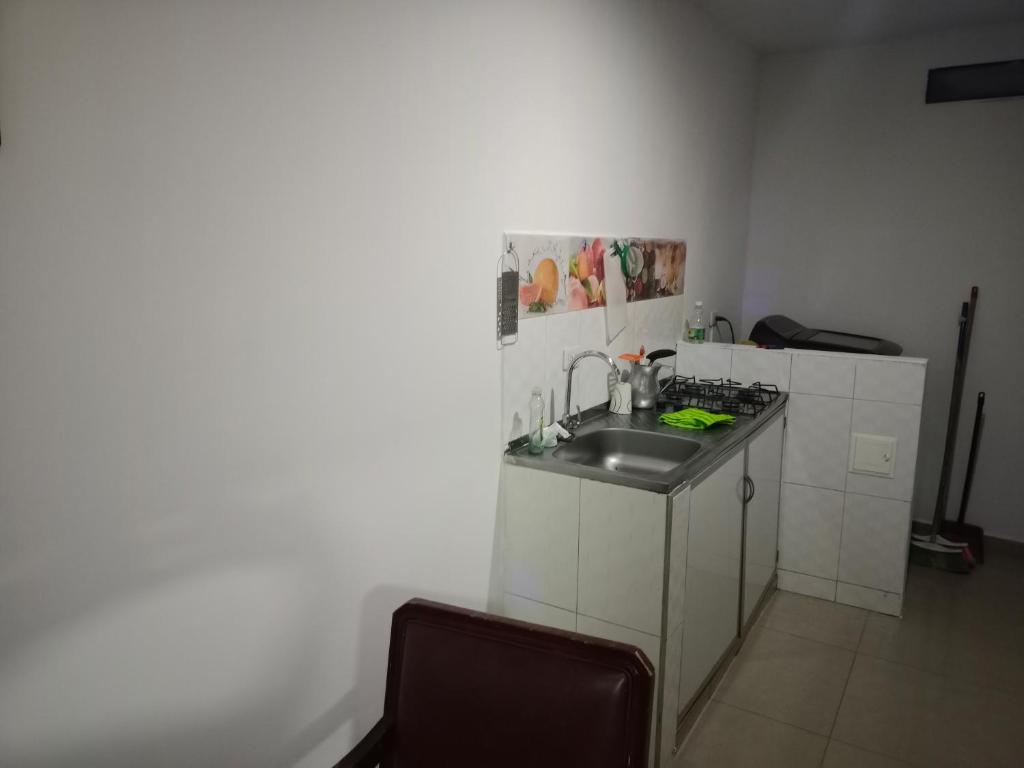 Kuchyň nebo kuchyňský kout v ubytování Apartaestudio Norte de Neiva