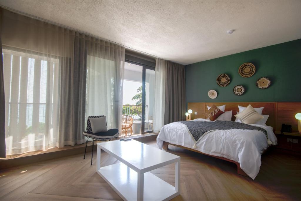 Postel nebo postele na pokoji v ubytování Gosun Beach Hotel