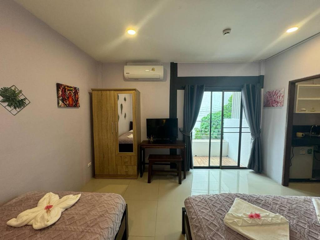 Postel nebo postele na pokoji v ubytování Pupa Rooms