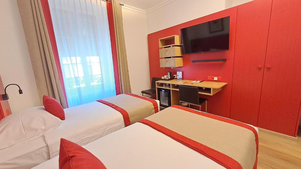 TV a/nebo společenská místnost v ubytování Hotel International & Terminus