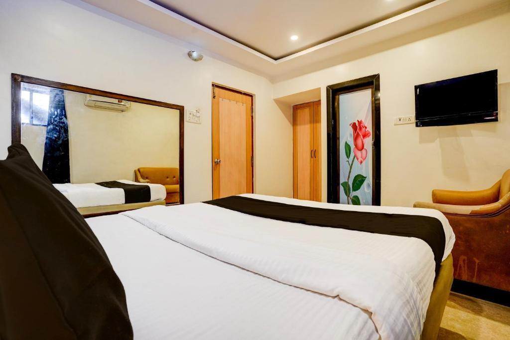 Postel nebo postele na pokoji v ubytování De Classico Hotel