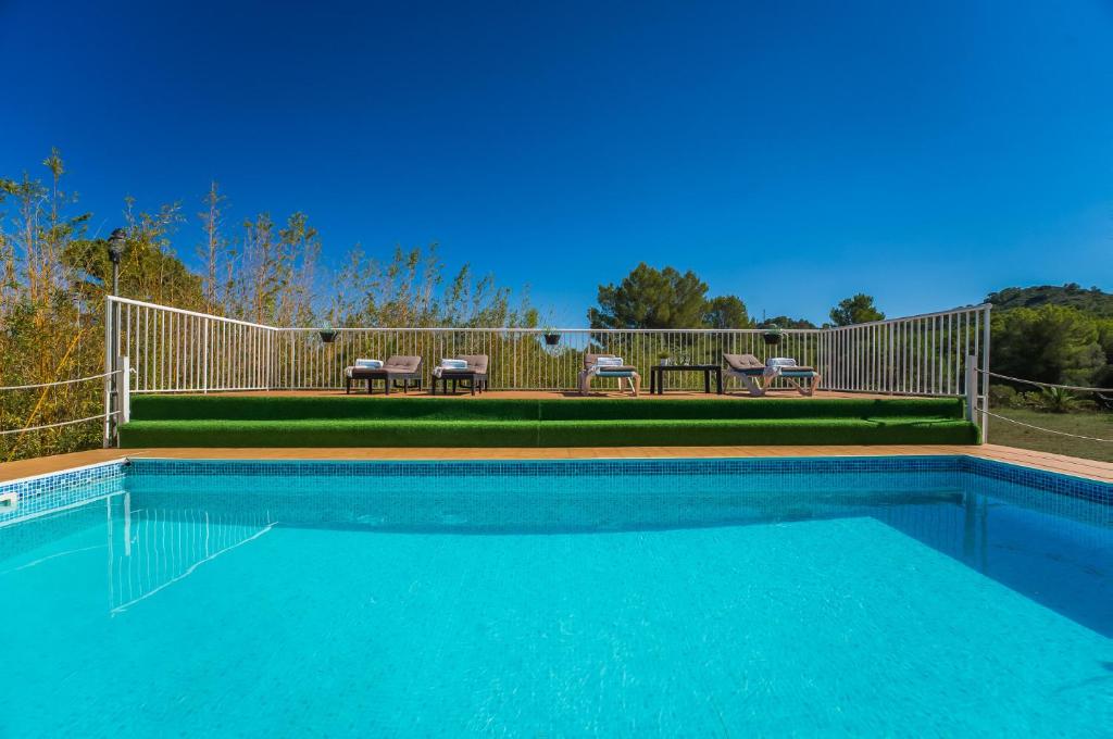 Bazén v ubytování Ideal Property Mallorca - Can Caragol Font de Sa Cala nebo v jeho okolí