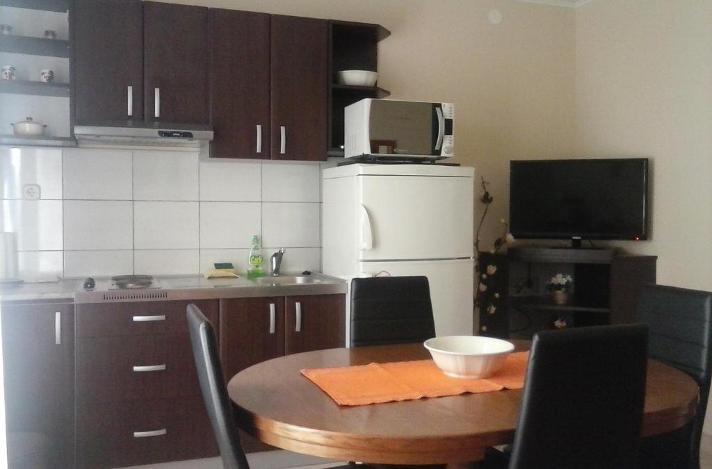 Kuchyň nebo kuchyňský kout v ubytování Apartments Roncevic #JOKO#