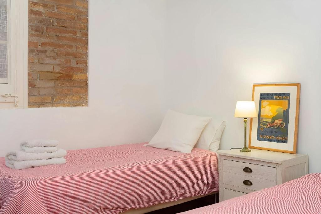 Postel nebo postele na pokoji v ubytování Filmoteca Sarria 1- wifi quiet bright comfi