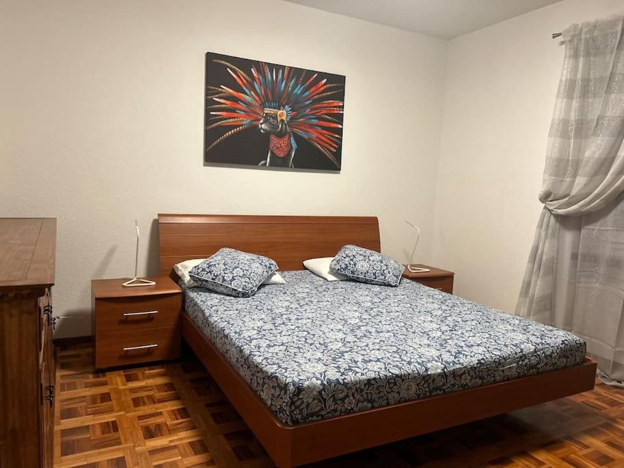 Postel nebo postele na pokoji v ubytování Melide lake apartment