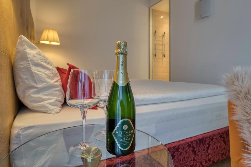 Postel nebo postele na pokoji v ubytování Hotel Sporting Trento