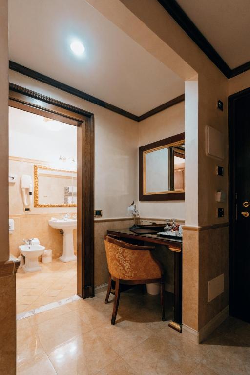 Koupelna v ubytování Hotel Pantheon