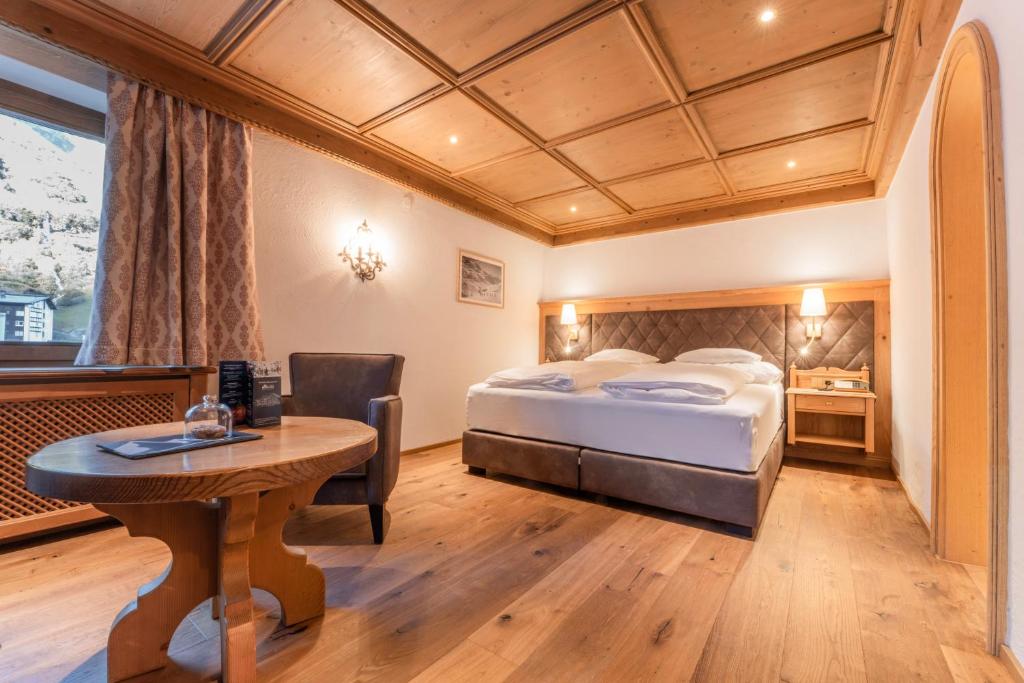 Postel nebo postele na pokoji v ubytování Hotel Ulli