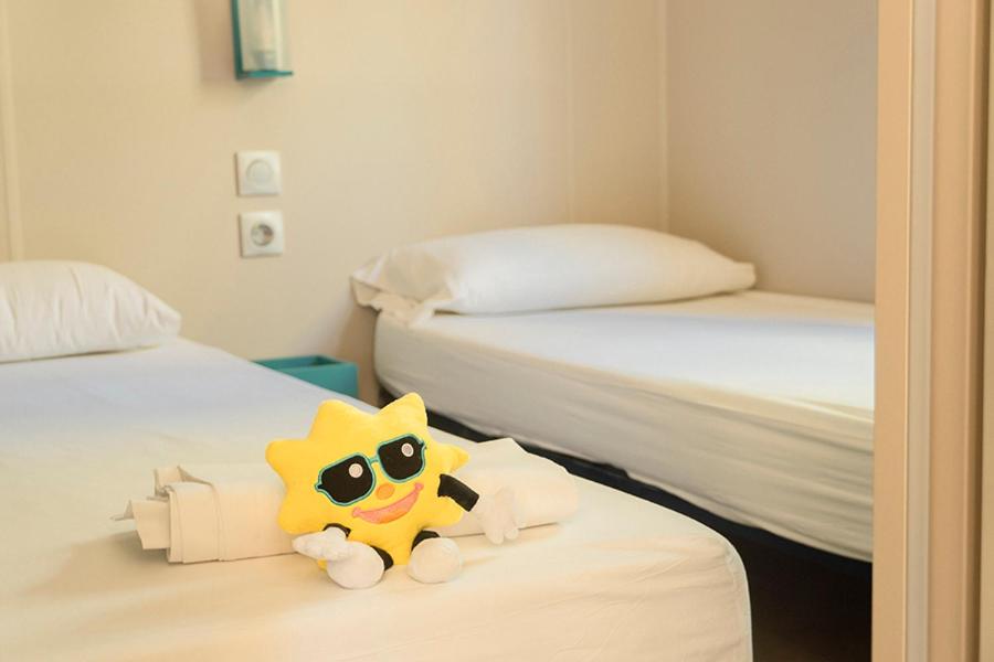 Posteľ alebo postele v izbe v ubytovaní Camping Sènia Caballo de Mar