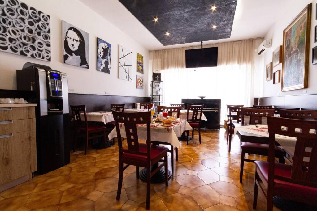 Kuchyň nebo kuchyňský kout v ubytování Hotel Guidi