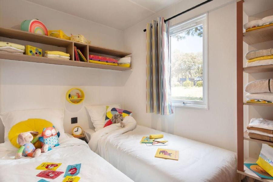 Posteľ alebo postele v izbe v ubytovaní Camping Sènia Caballo de Mar