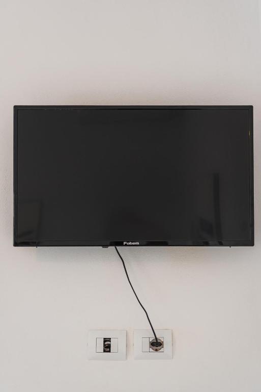 TV a/nebo společenská místnost v ubytování Central Vila 5