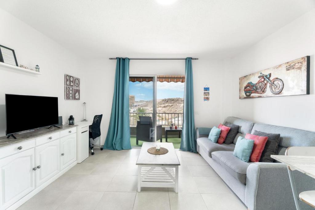 TV a/nebo společenská místnost v ubytování Sunny Halley apartament