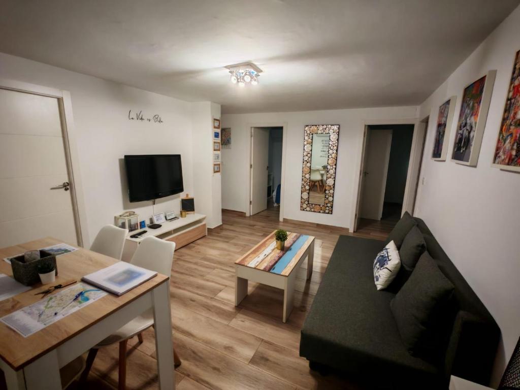 Televízia a/alebo spoločenská miestnosť v ubytovaní La Vida es Bella Córdoba