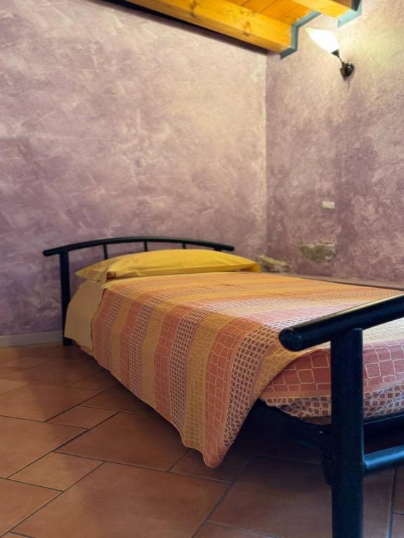 Postel nebo postele na pokoji v ubytování B&B Al Vec Licinsi'