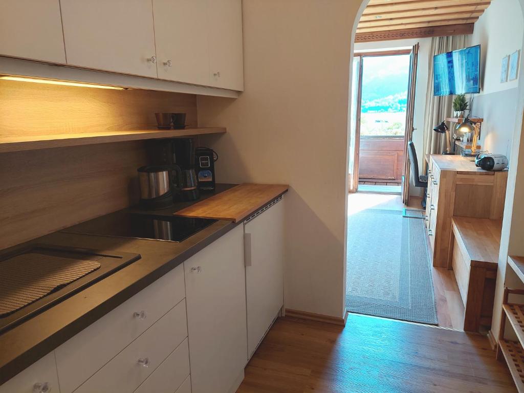 Kuchyň nebo kuchyňský kout v ubytování Abis Ferienwohnung Salzkammergut