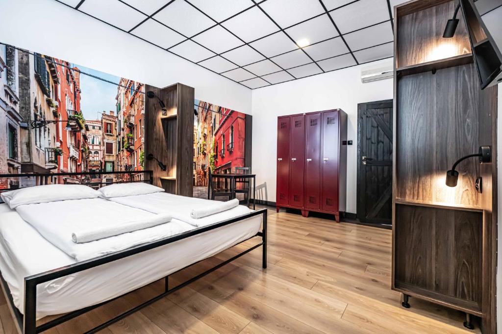 Postel nebo postele na pokoji v ubytování Vola Hostel