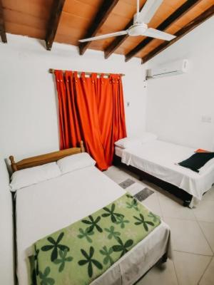 Postel nebo postele na pokoji v ubytování Posada San Miguel