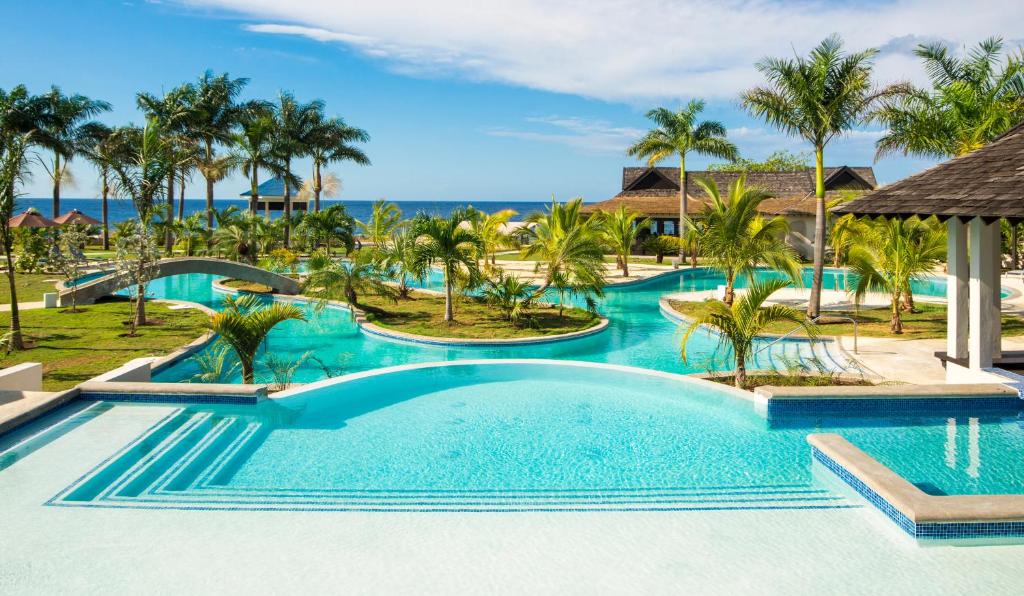 an image of a swimming pool at a resort at The Cliff Hotel in Negril