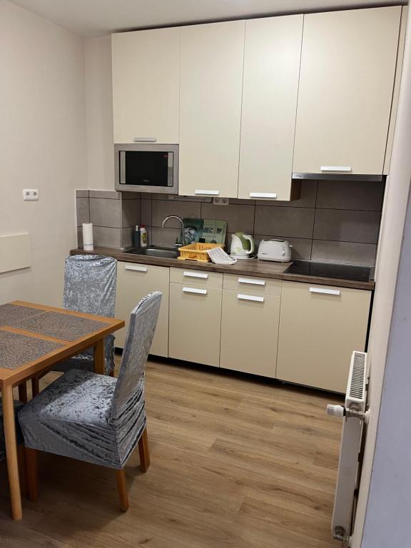 Kuchyňa alebo kuchynka v ubytovaní Brookforest Apartman