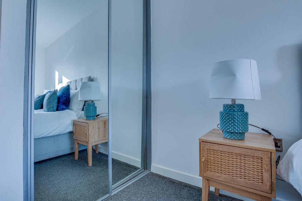 Postel nebo postele na pokoji v ubytování Stay Yorkshire City Centre Apartments