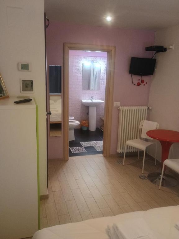TV a/nebo společenská místnost v ubytování Terrazza Sui Sassi