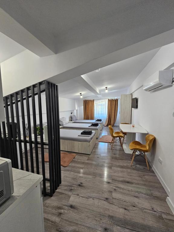 Postel nebo postele na pokoji v ubytování DIDI Apartament
