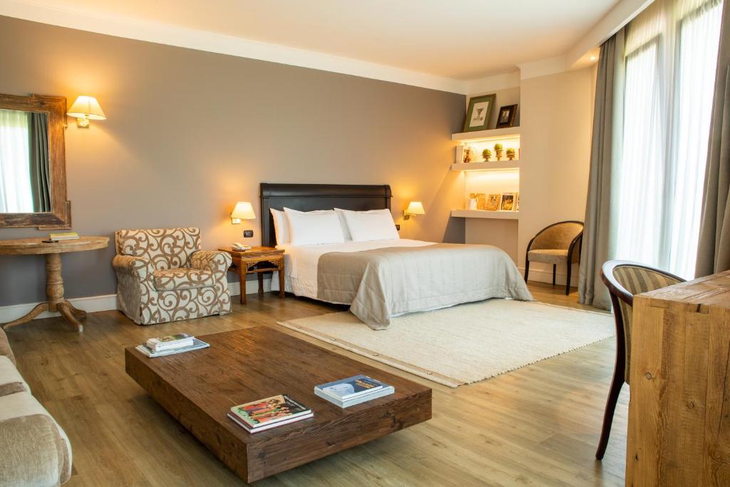 Postel nebo postele na pokoji v ubytování Hotel Touring