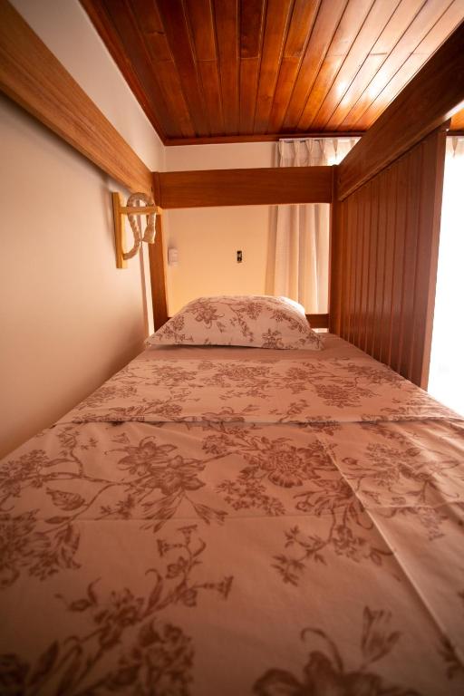 Postel nebo postele na pokoji v ubytování NaCasa Hostel