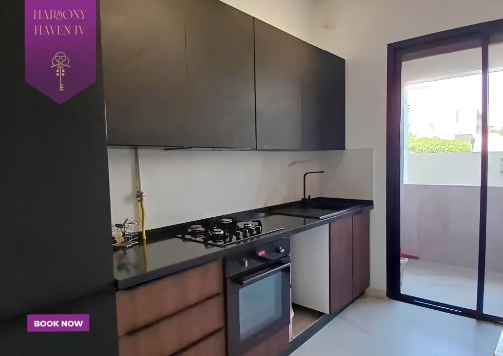 Kuchyň nebo kuchyňský kout v ubytování Harmony Haven IV