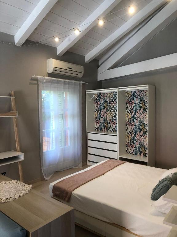 Postel nebo postele na pokoji v ubytování Casa Mabèl