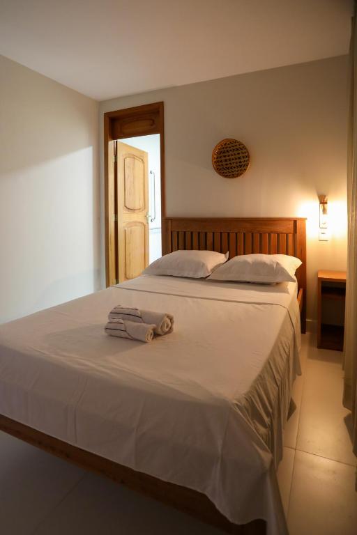 Postel nebo postele na pokoji v ubytování NaCasa Hostel