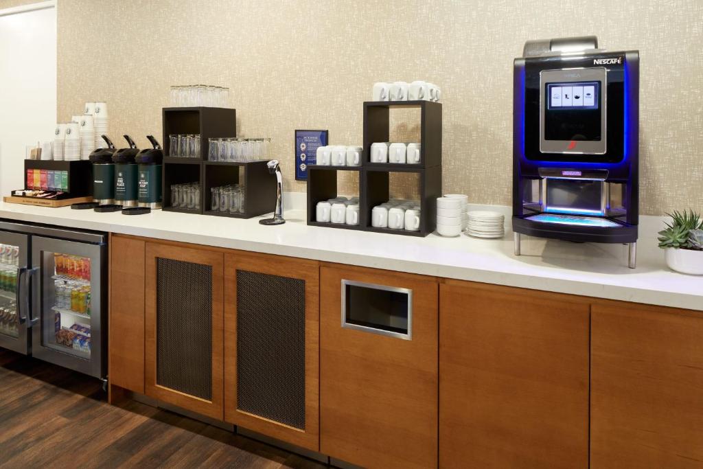 a cash counter with a pay station in a store at Delta Hotels by Marriott Ottawa City Centre in Ottawa