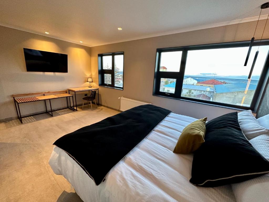 Postel nebo postele na pokoji v ubytování Patagonia Hotel & Apart Suite