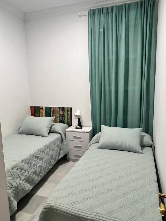Postel nebo postele na pokoji v ubytování Casa dalia