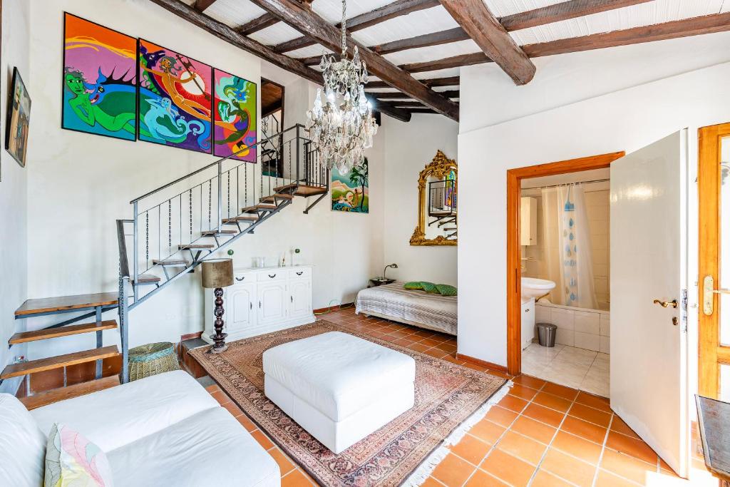 A bed or beds in a room at Torre Del Melograno With Heated Pool - Happy Rentals