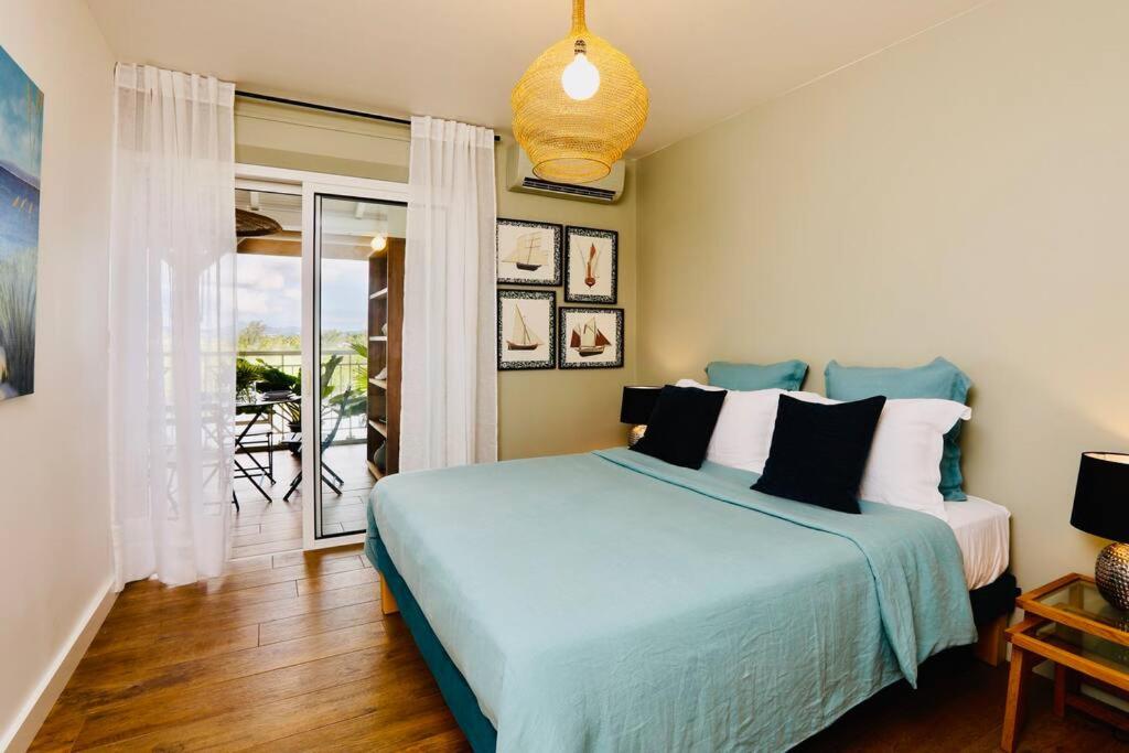 Postel nebo postele na pokoji v ubytování Appartement Etang Zabricot - Vue sur la Marina