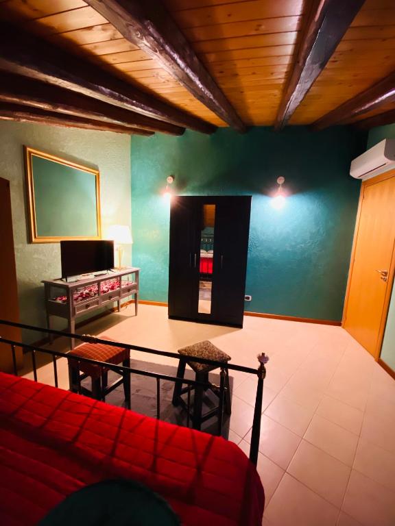 TV a/nebo společenská místnost v ubytování Bianca di Navarra House
