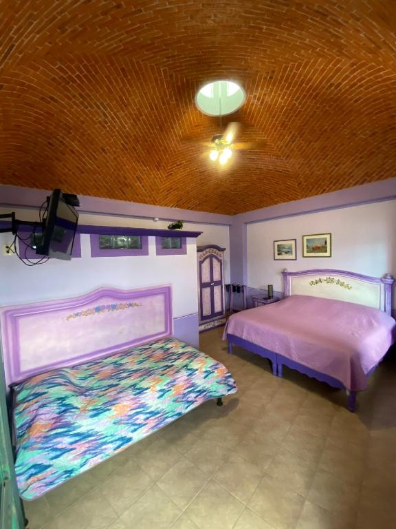 Postel nebo postele na pokoji v ubytování Casa Morada