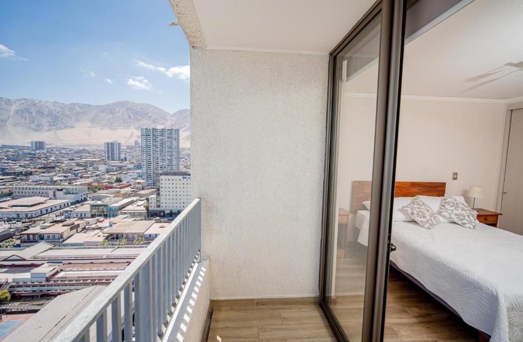 Departamento vista al marにあるベッド