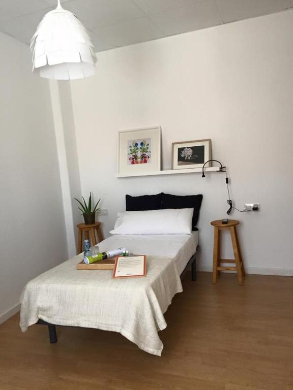 Postel nebo postele na pokoji v ubytování MON ComeySueña Guesthouse