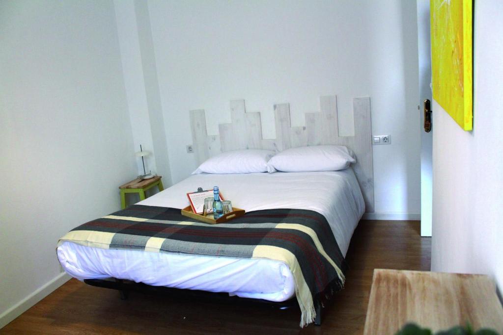 Postel nebo postele na pokoji v ubytování MON ComeySueña Guesthouse
