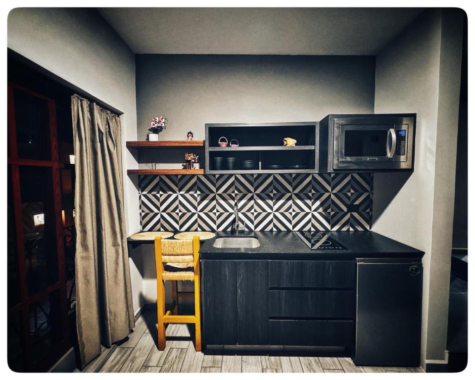 Kuchyň nebo kuchyňský kout v ubytování Casa Tahíí