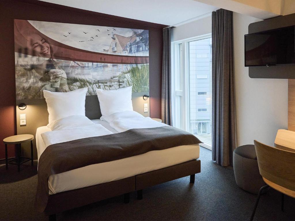 Postel nebo postele na pokoji v ubytování B&B HOTEL Vejle