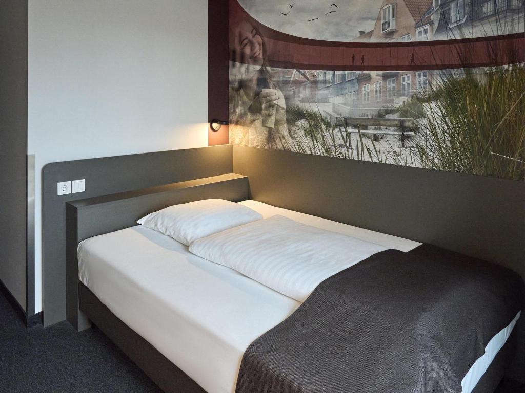Postel nebo postele na pokoji v ubytování B&B HOTEL Vejle
