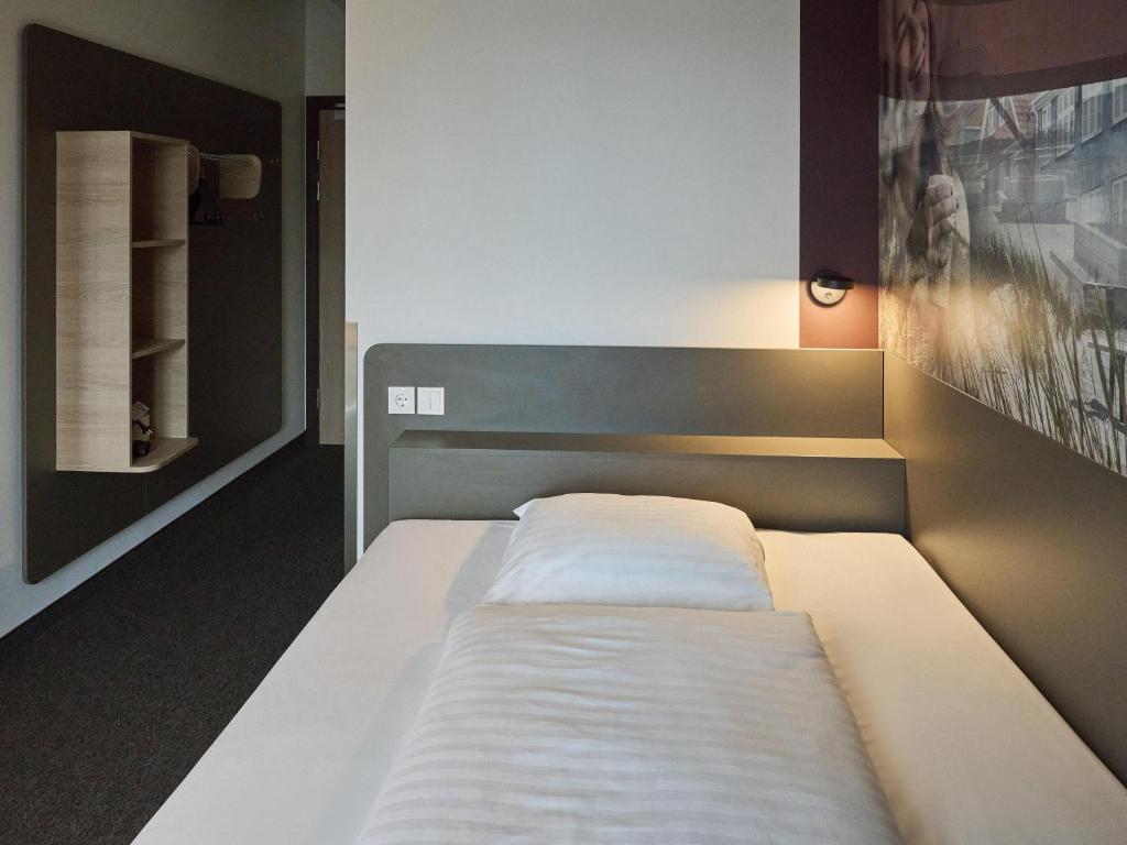 Postel nebo postele na pokoji v ubytování B&B HOTEL Vejle